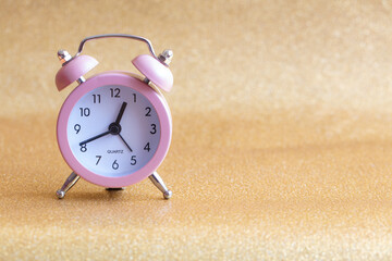Isolated pink quartz alarm clock for design purpose