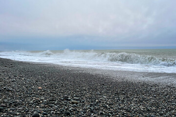Sea or ocean with waves and cloudy sky