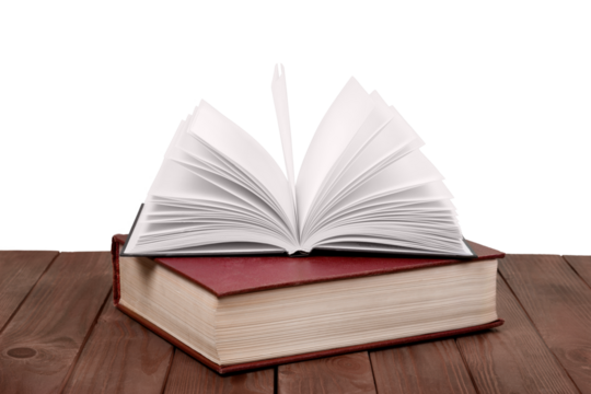 Old books on dark wooden table background