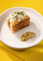 casserole with vegetables on a yellow background