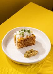 casserole with vegetables on a yellow background
