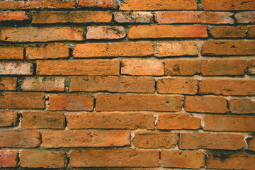 The ancient brick wall background, old brick wall.