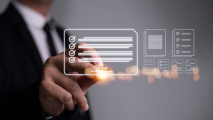 Electronic signature and paperless office concept. A person uses a pen to sign electronic documents on digital documents on a virtual screen. E-signing. Technology and document management