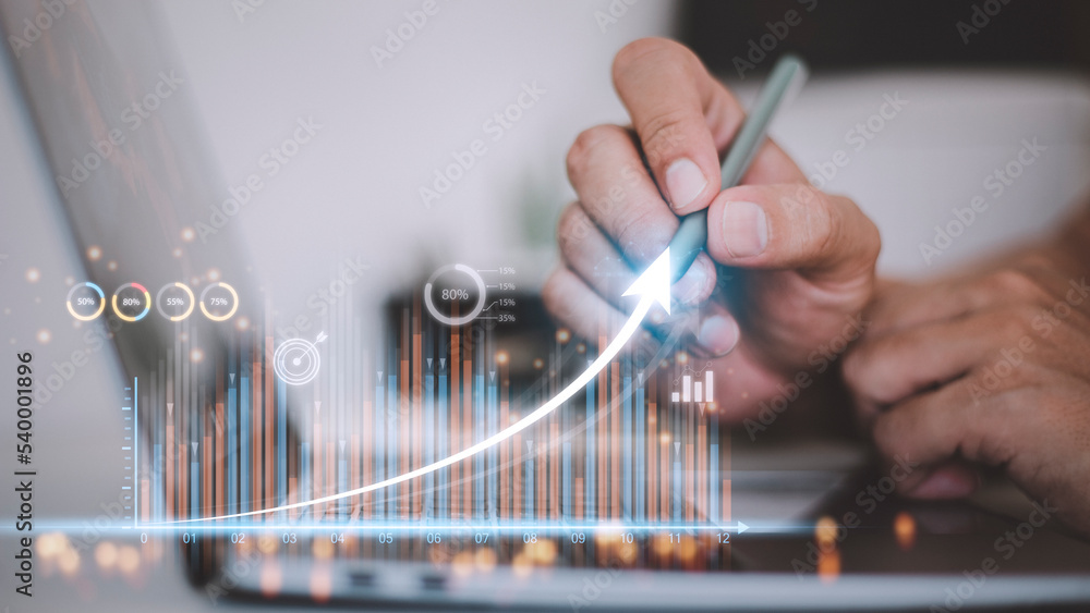 Poster people using tablets and using his finger to touch the screen with a business graph showing up in a 