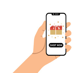 Hand holding mobile phone with gift box on screen