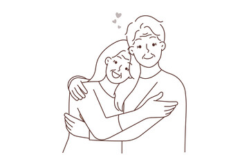 Happy elderly couple hugging