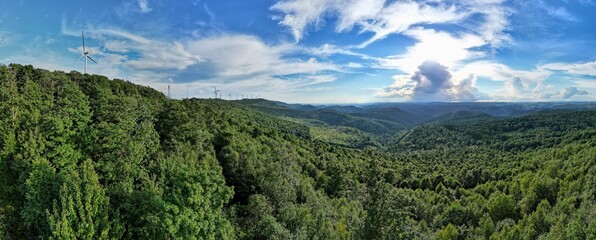 Panoramic shot of wind turbines on the forest mountains in Eglon West Virginia