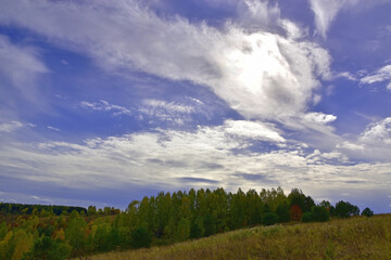 Fototapeta na wymiar Autumn sky with light clouds