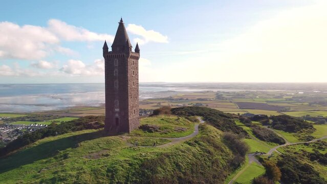 Aerial view of the Scrabo Tower and the green landscape in Newtownards, Northern Ireland