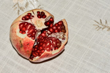 Lunch of traditional Chinese food sausage, rolls, chili, pomegranate, soy bean curd