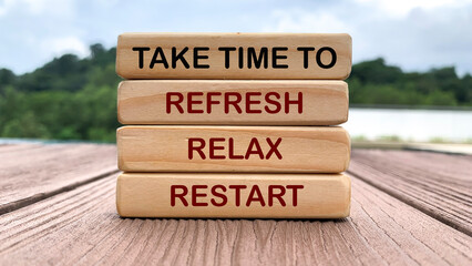 Take time to refresh, relax and restart text on wooden blocks with nature and park background. Time off concept. - obrazy, fototapety, plakaty