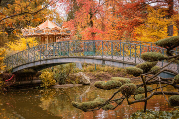 Iron footbridge of the Jardin Public park in Autumn in Bordeaux, France