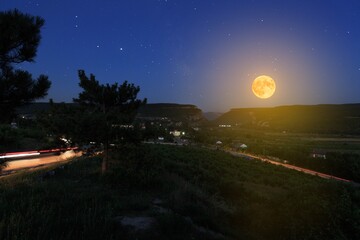 Stars with big moon with the evening sky.