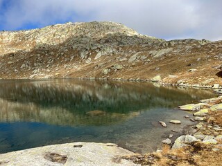 A crystal clear alpine lakes Laghi d'Orsirora during a beautiful autumn day in the mountainous area...