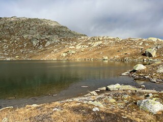 A crystal clear alpine lakes Laghi d'Orsirora during a beautiful autumn day in the mountainous area...