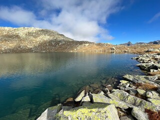 A crystal clear alpine lakes Laghi d'Orsirora during a beautiful autumn day in the mountainous area...