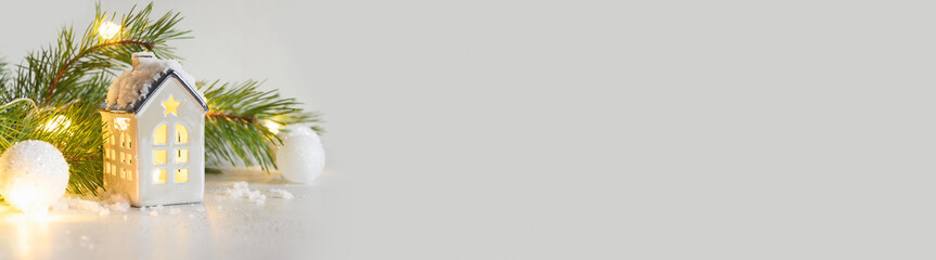 Banner of Christmas little house for fairy tale with a magical snow-covered house in white Xmas...