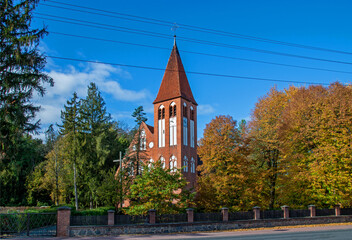 General view and architectural details of the Protestant temple, erected in 1905, now as the Catholic Church of Our Lady of Perpetual Help in the town of Spychowo in Masuria in Poland.