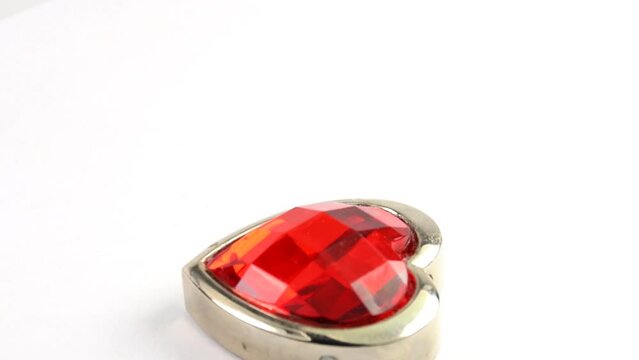 red crystal heart on a turn table