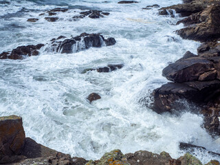 Ecume au pied des falaises, Île d'Yeu, Vendée, Pays de la Loire, France

