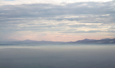 Obraz premium landscape in the fog and clouds