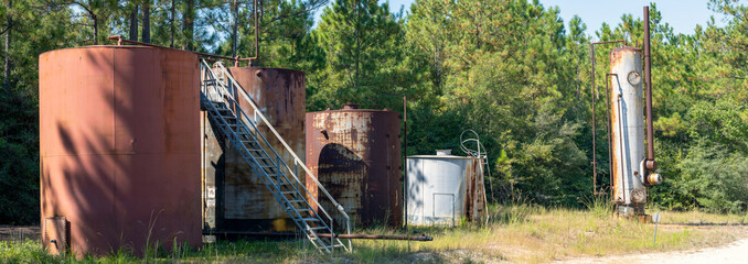 Petroleum storage tanks in the forest of south eastern Texas.