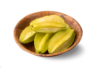 Starfruits in a bowl isolated over white background