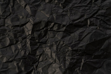 しわくちゃな色紙　黒色　テクスチャ
