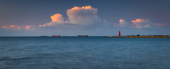 Bastic Sea in Nowy Port withe the red lighthouse at sunset, Gdansk.