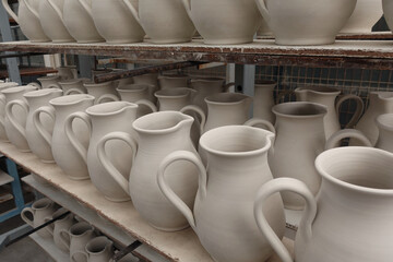 Naklejka na ściany i meble drying pottery ceramic pitchers
