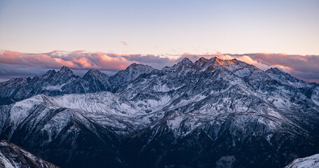 Obraz na płótnie Canvas snowy mountain sunset