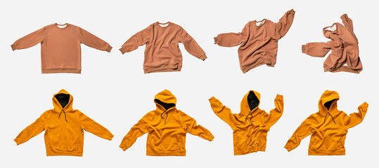 Fashionable flying brown cotton stylish sweatshirt, orange hoodie isolated on gray background....