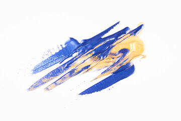 Alcohol ink abstract luxury backdrop. Gold blue contrasting brushstrokes blots and stains of...