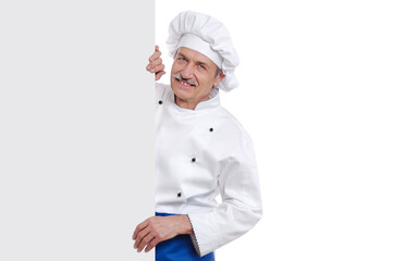 Close-up portrait of a chef holding blank board