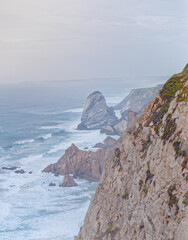 Storm crashing into beach cliff