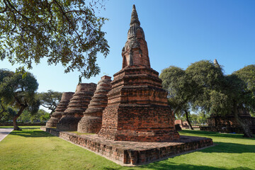 Ruins of pagodas, Buddha images and the walls of Wat Phra Ram, Ayutthaya, Thailand that were...