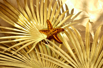 fantasy abstraction background of golden color with brown starfish