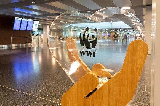 Oslo, Norway - September 28, 2022: A WWF Donation Box in Oslo airport. The World Wide Fund for Nature Inc. is an international non-governmental organization. 