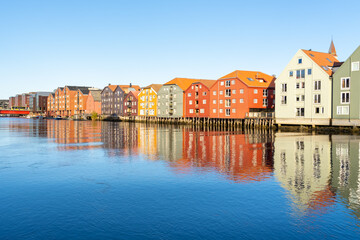 Waterfront colorful houses in Bakklandet, a neighborhood in the city of Trondheim, Norway. 