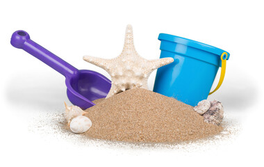 Fototapeta na wymiar Toy Bucket and Shovel with Sand and Seashells