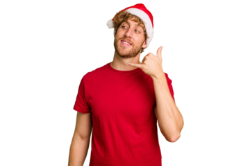 Young caucasian man wearing a Christmas Santa hat isolated on white background showing a mobile phone call gesture with fingers.