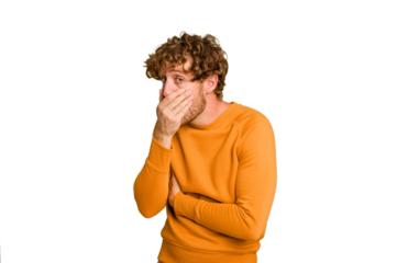 Young caucasian man isolated on green chroma background scared and afraid.