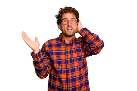 Young caucasian curly hair man isolated Young caucasian man with curly hair isolated screaming with rage.