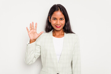 Young business Indian woman isolated on white background smiling cheerful showing number five with...