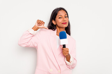 Fototapeta na wymiar Young TV presenter indian woman isolated on white background feels proud and self confident, example to follow.