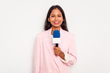 Young TV presenter indian woman isolated on white background happy, smiling and cheerful. - obrazy, fototapety, plakaty