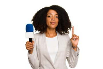 Young TV presenter African American woman with a microphone isolated showing number one with finger.