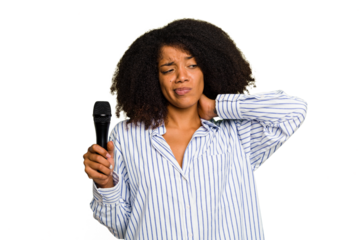 Young African American singer woman holding a microphone isolated touching back of head, thinking and making a choice.
