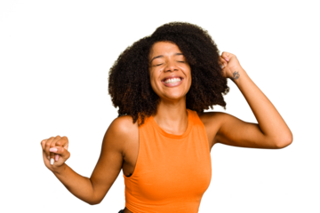 Young African American woman isolated dancing and having fun.