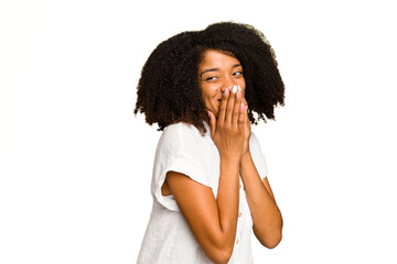 Fototapeta na wymiar Young African American woman isolated laughing about something, covering mouth with hands.